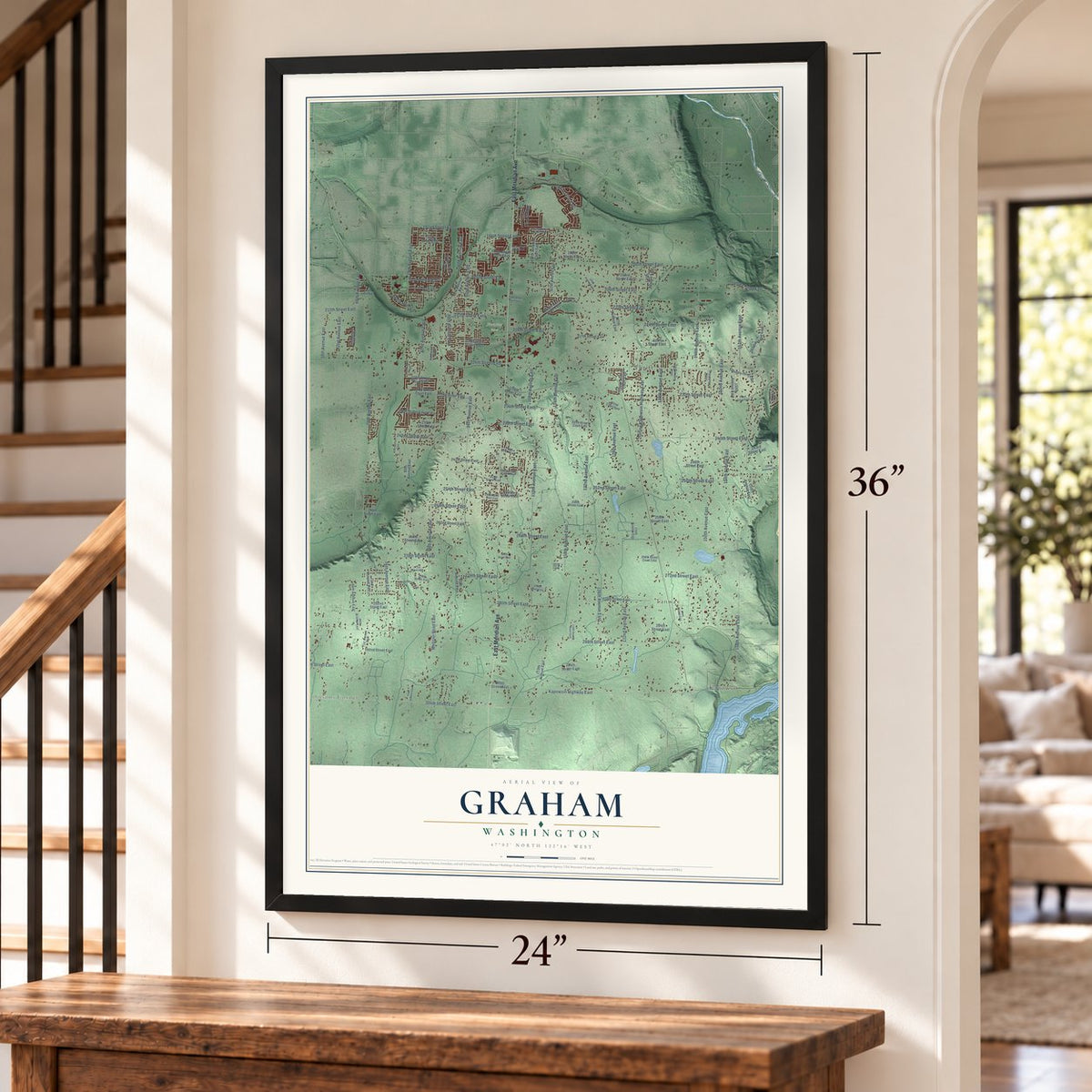 Graham, Washington map, 24 x 36 inch print in a black frame by a staircase
