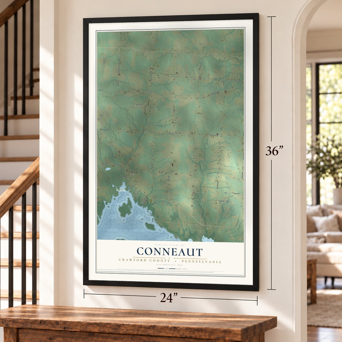 Conneaut, Crawford County, Pennsylvania map, 24 x 36 inch print in a black frame by a staircase