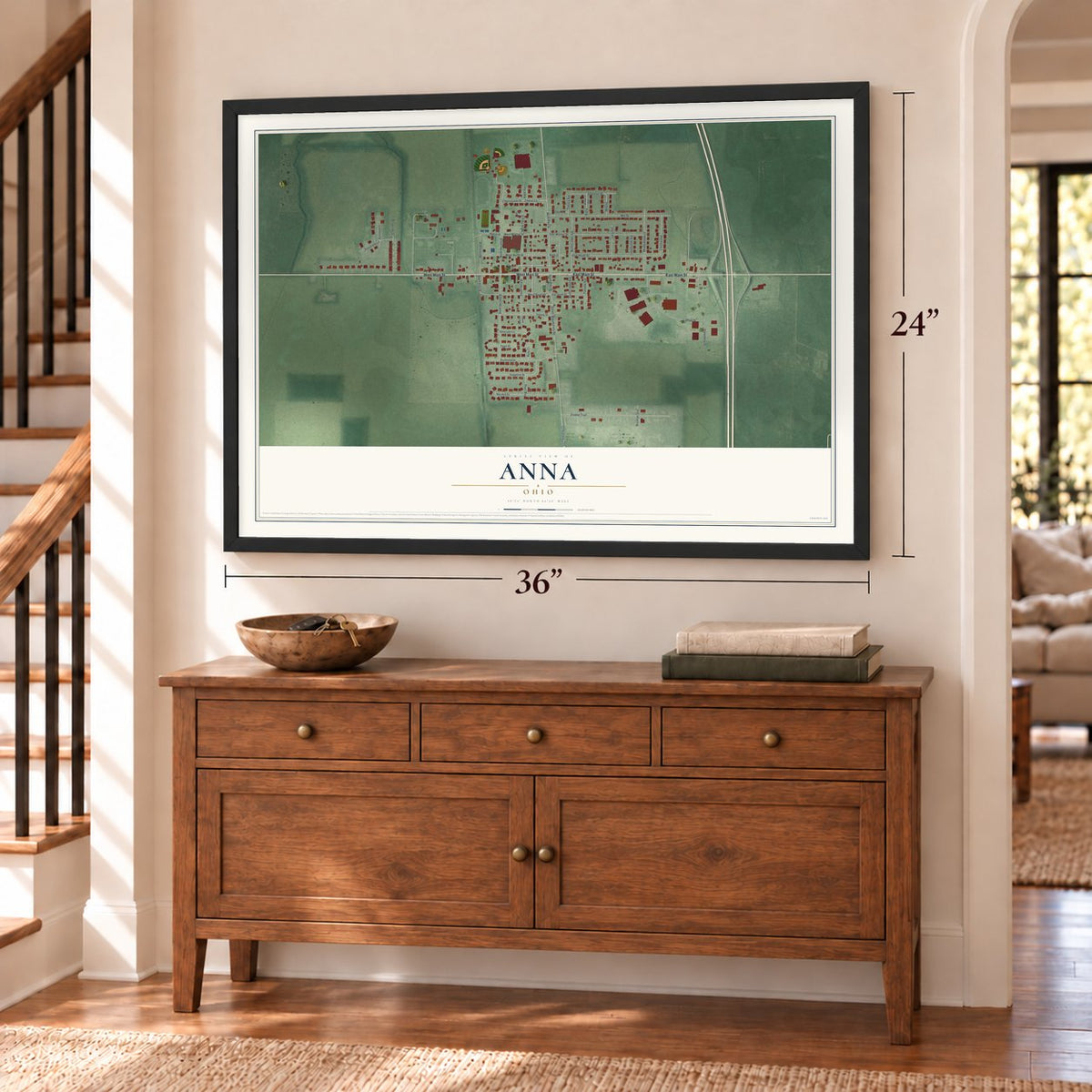 Anna, Ohio map, 24 x 36 inch print in a black frame above a dresser by a staircase