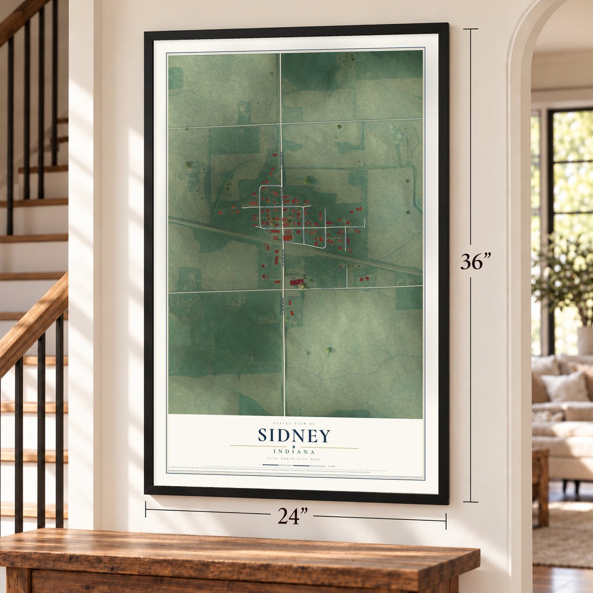 Sidney, Indiana map, 24 x 36 inch print in a black frame by a staircase