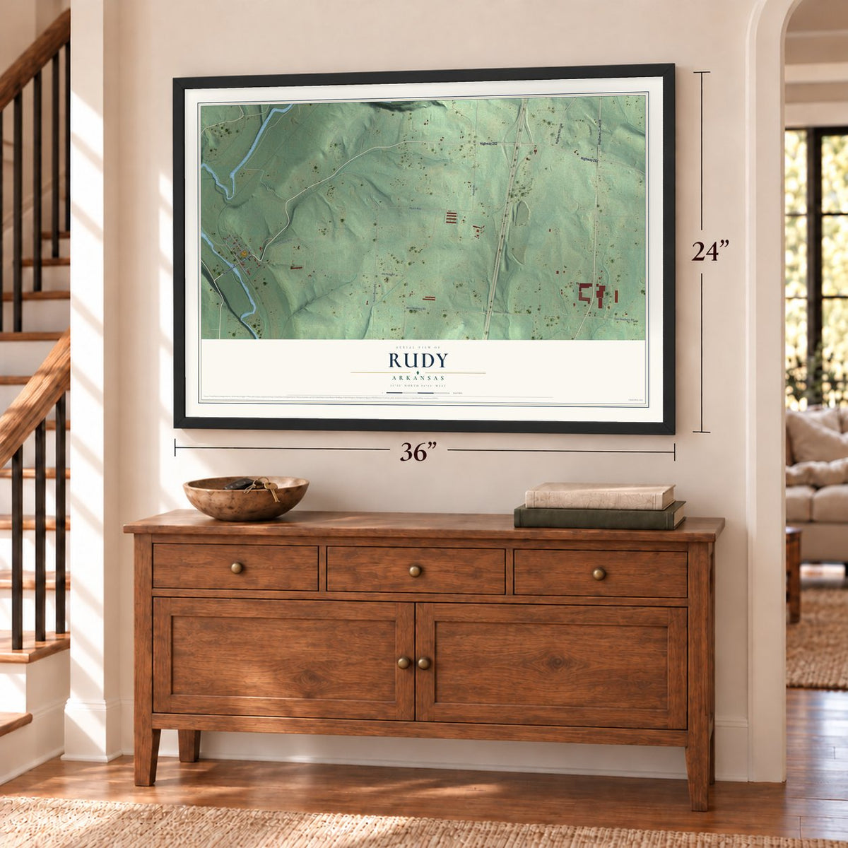 Rudy, Arkansas map, 24 x 36 inch print in a black frame above a dresser by a staircase