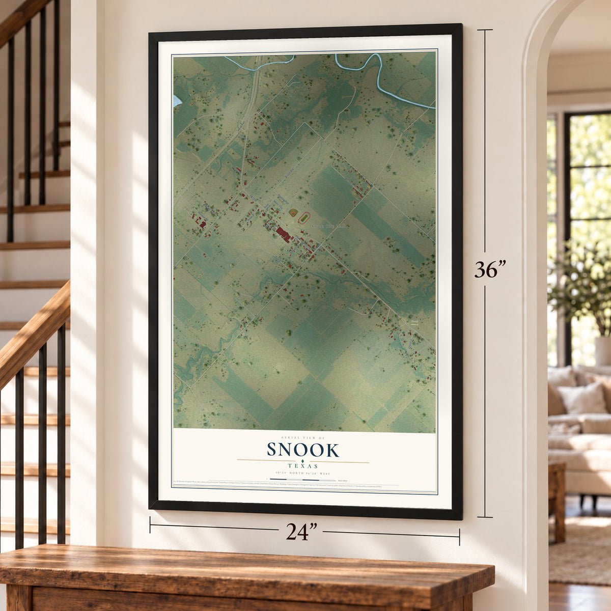 Snook, Texas map, 24 x 36 inch print in a black frame by a staircase
