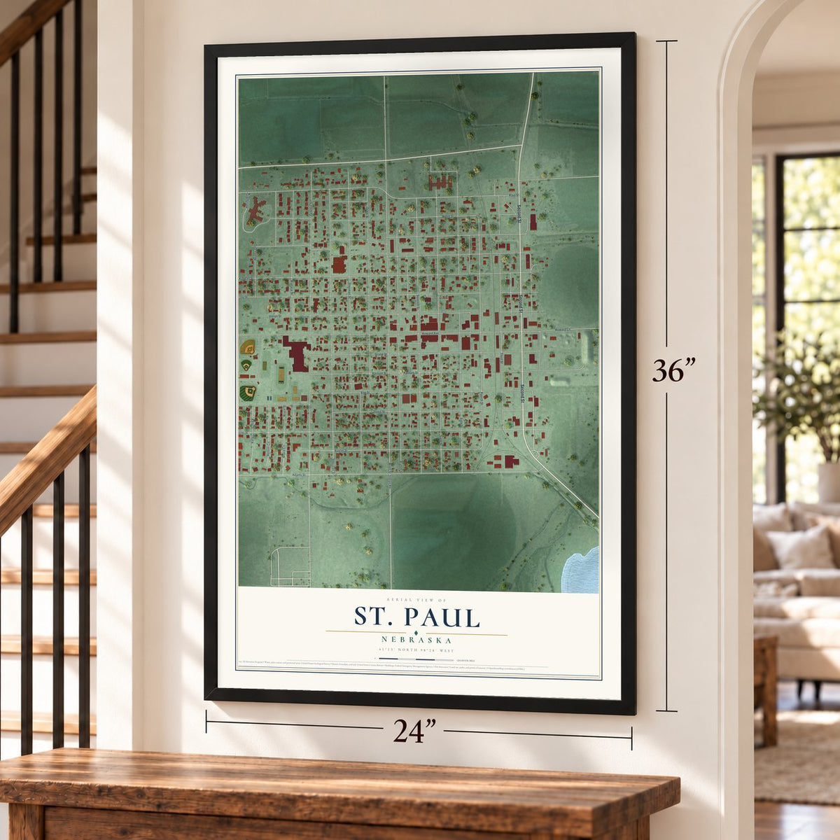 St. Paul, Nebraska map, 24 x 36 inch print in a black frame by a staircase
