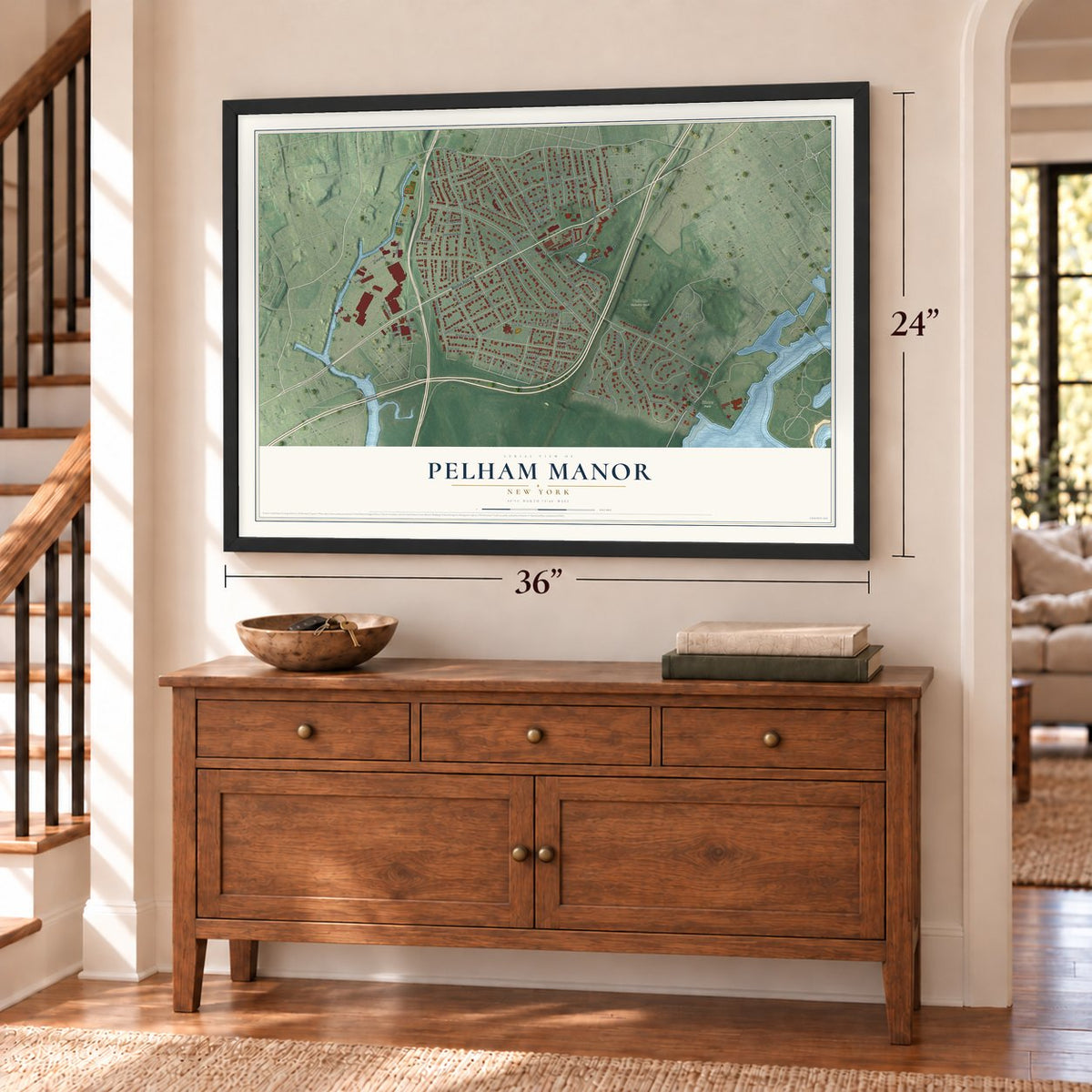 Pelham Manor, New York map, 24 x 36 inch print in a black frame above a dresser by a staircase