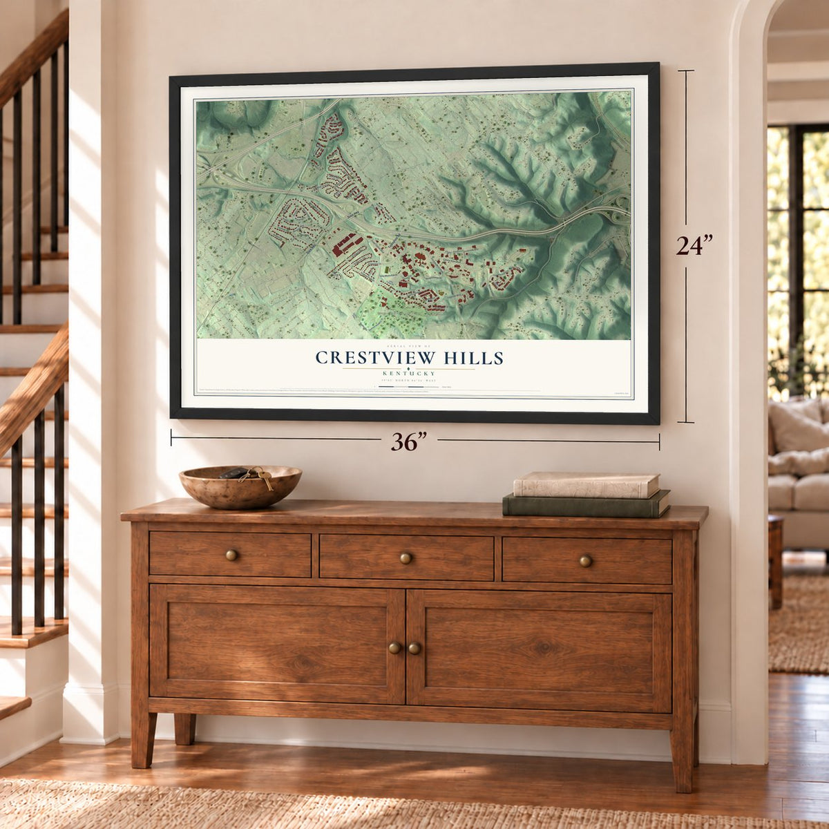 Crestview Hills, Kentucky map, 24 x 36 inch print in a black frame above a dresser by a staircase
