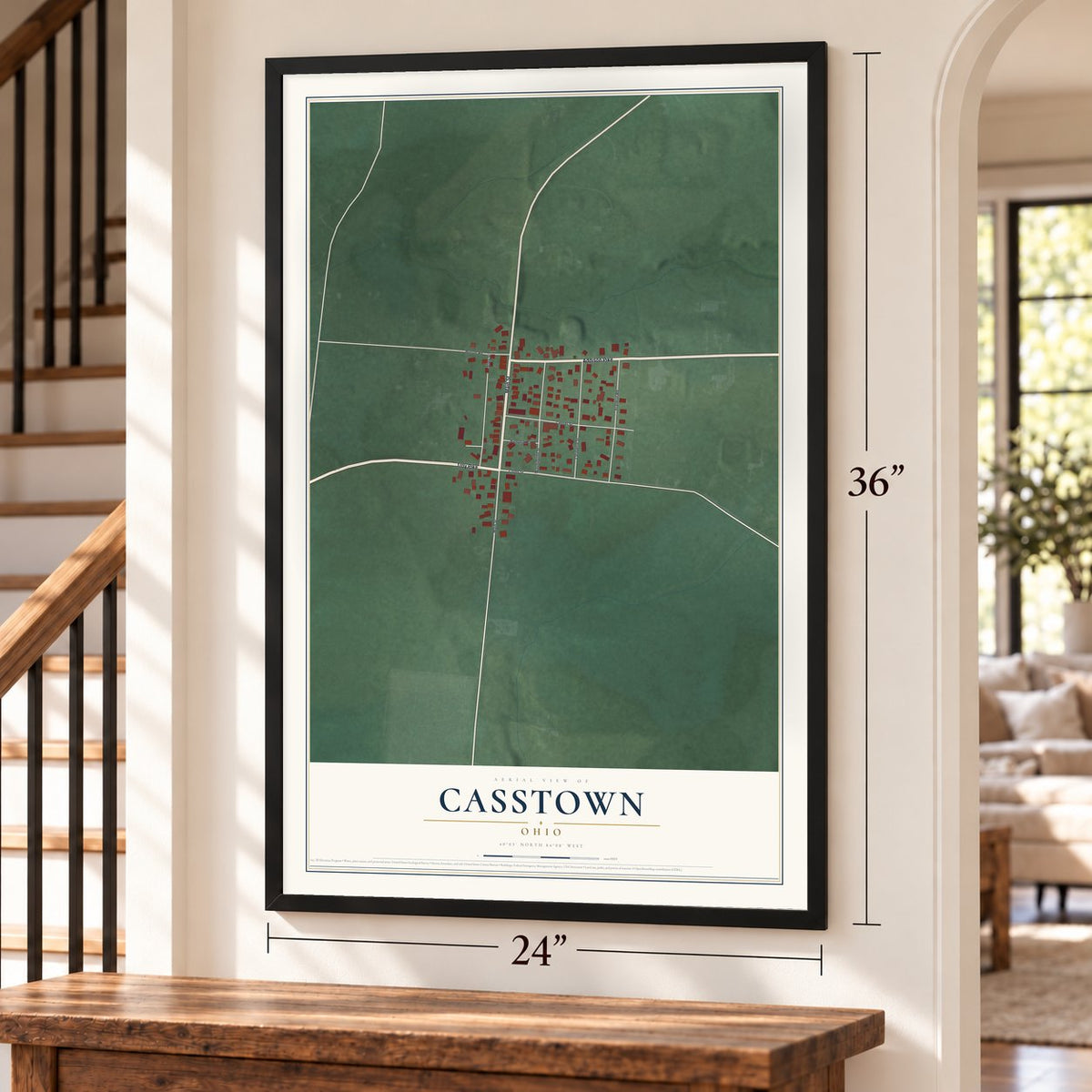Casstown, Ohio map, 24 x 36 inch print in a black frame by a staircase