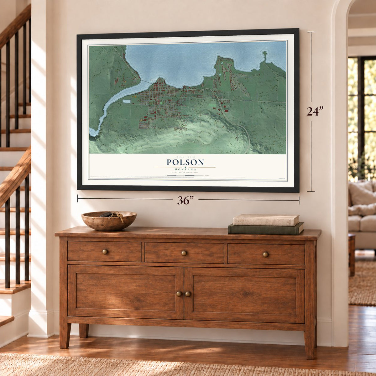 Polson, Montana map, 24 x 36 inch print in a black frame above a dresser by a staircase