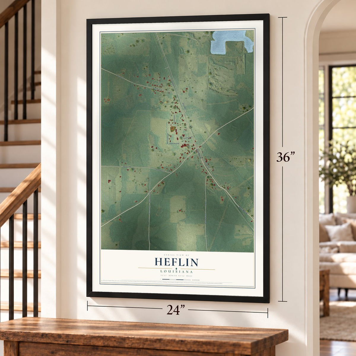 Heflin, Louisiana map, 24 x 36 inch print in a black frame by a staircase