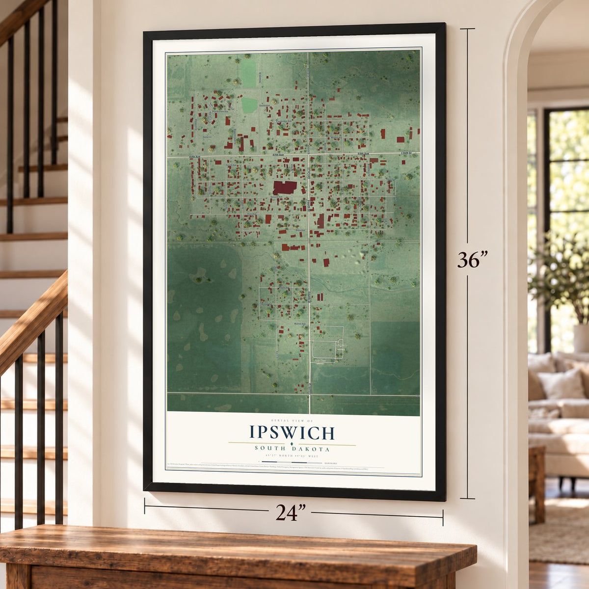 Ipswich, South Dakota map, 24 x 36 inch print in a black frame by a staircase