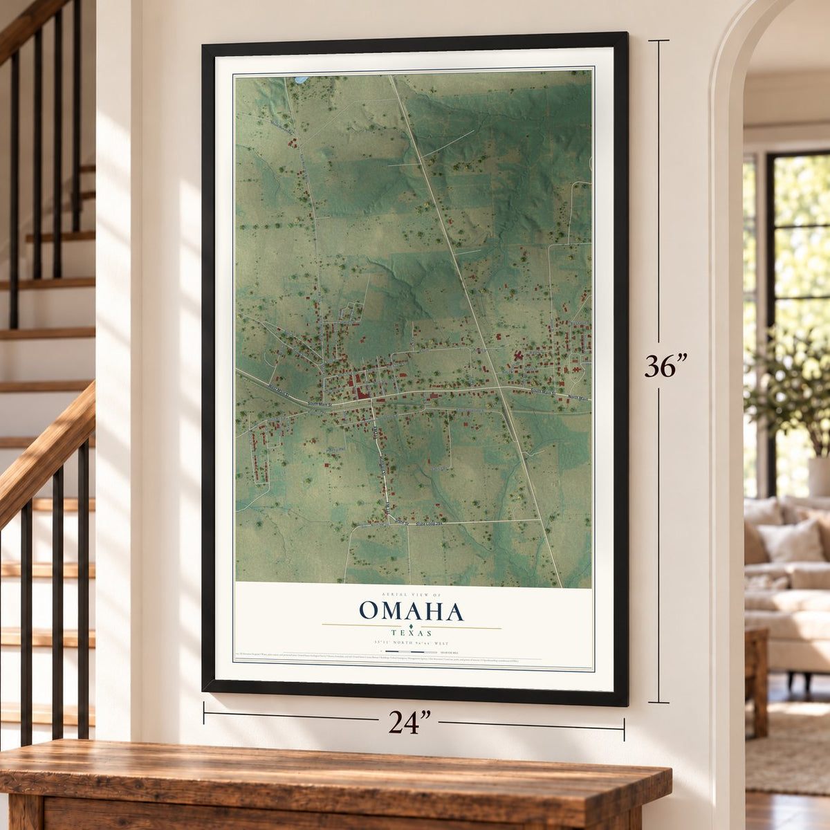 Omaha, Texas map, 24 x 36 inch print in a black frame by a staircase