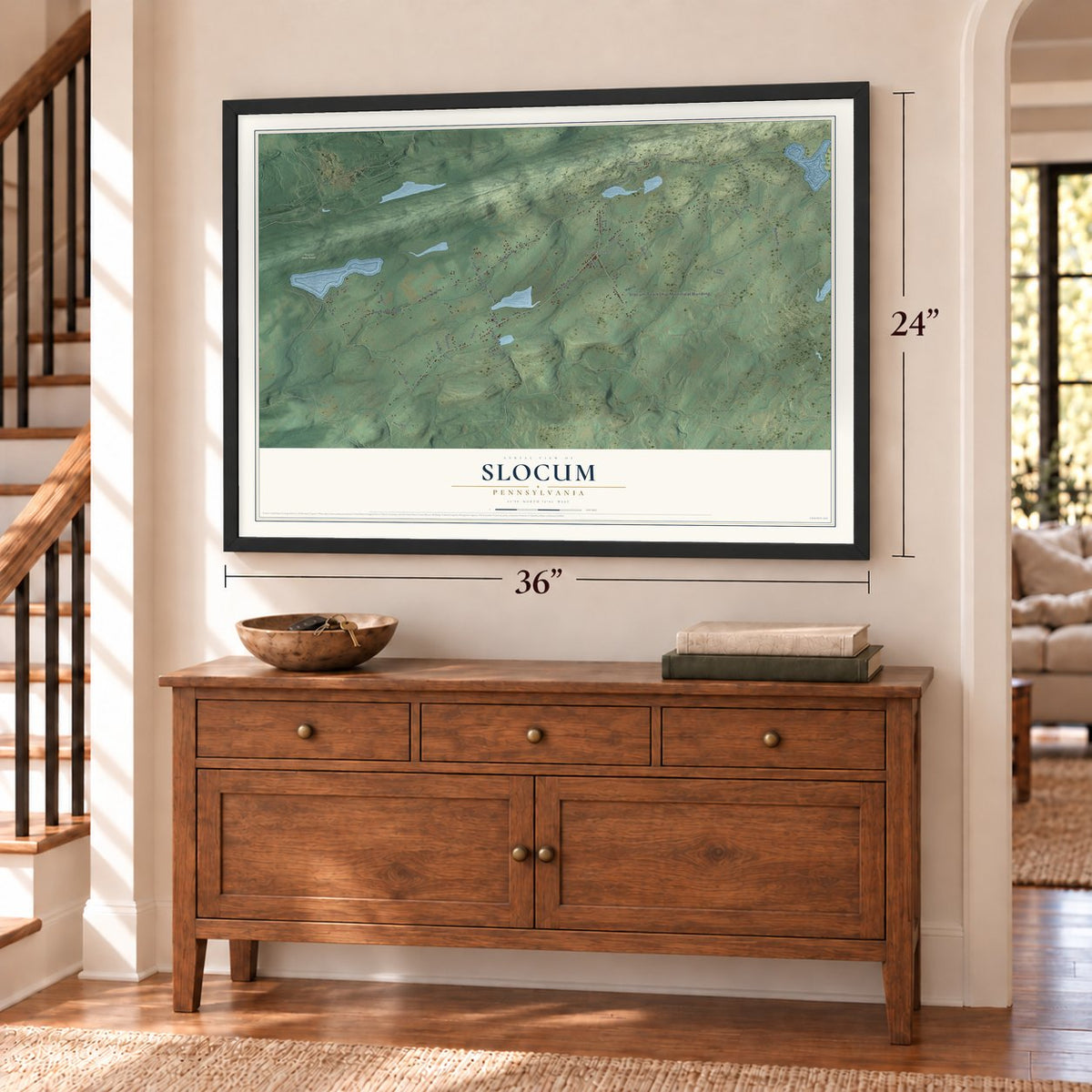Slocum, Pennsylvania map, 24 x 36 inch print in a black frame above a dresser by a staircase