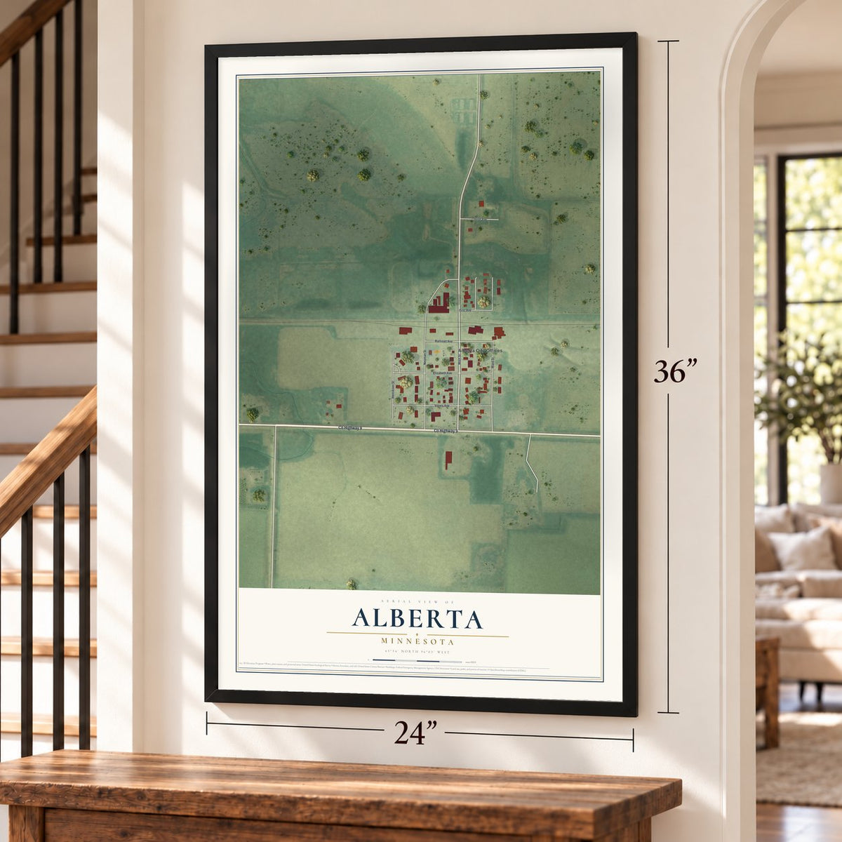 Alberta, Minnesota map, 24 x 36 inch print in a black frame by a staircase