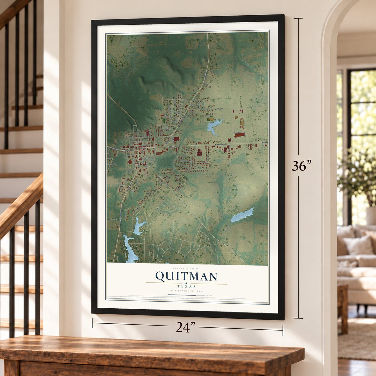 Quitman, Texas map, 24 x 36 inch print in a black frame by a staircase