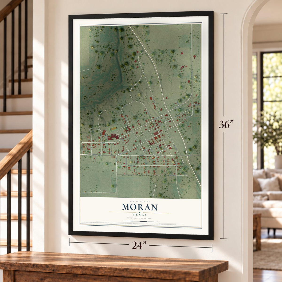 Moran, Texas map, 24 x 36 inch print in a black frame by a staircase
