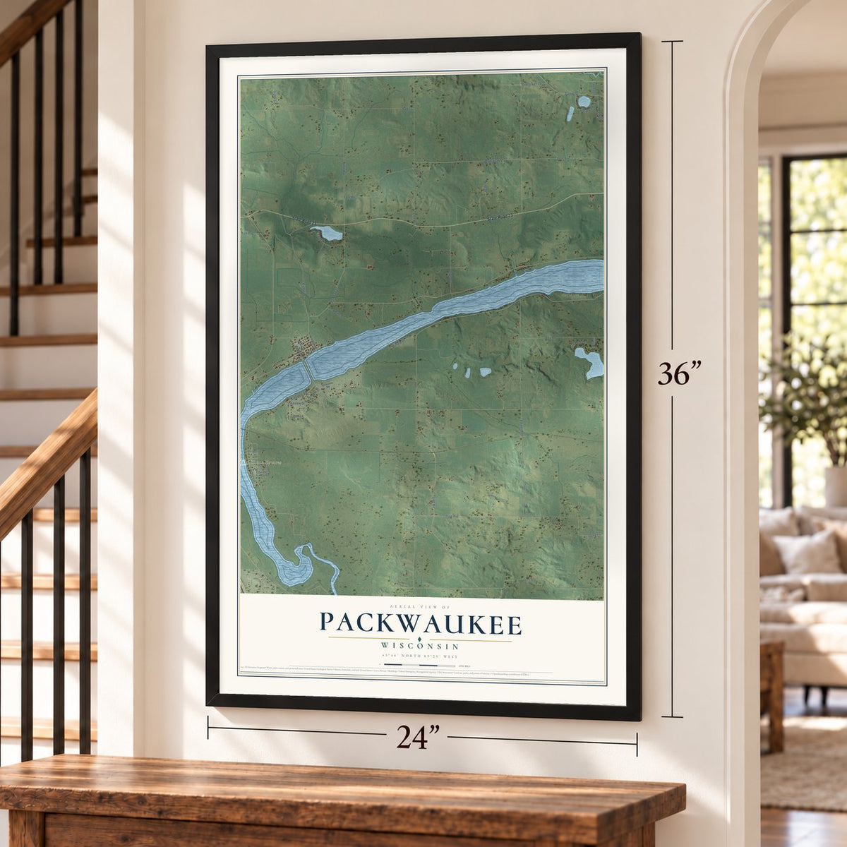 Packwaukee, Wisconsin map, 24 x 36 inch print in a black frame by a staircase