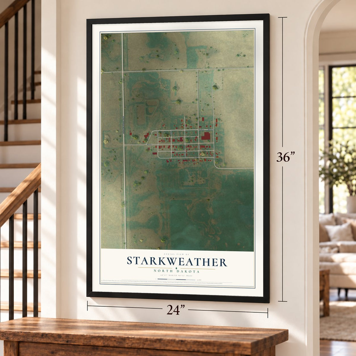 Starkweather, North Dakota map, 24 x 36 inch print in a black frame by a staircase