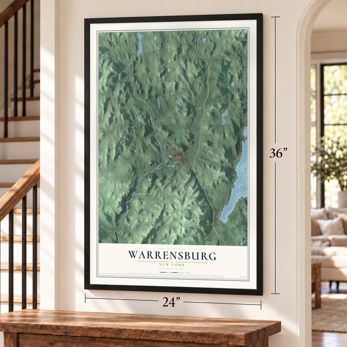 Warrensburg, New York map, 24 x 36 inch print in a black frame by a staircase