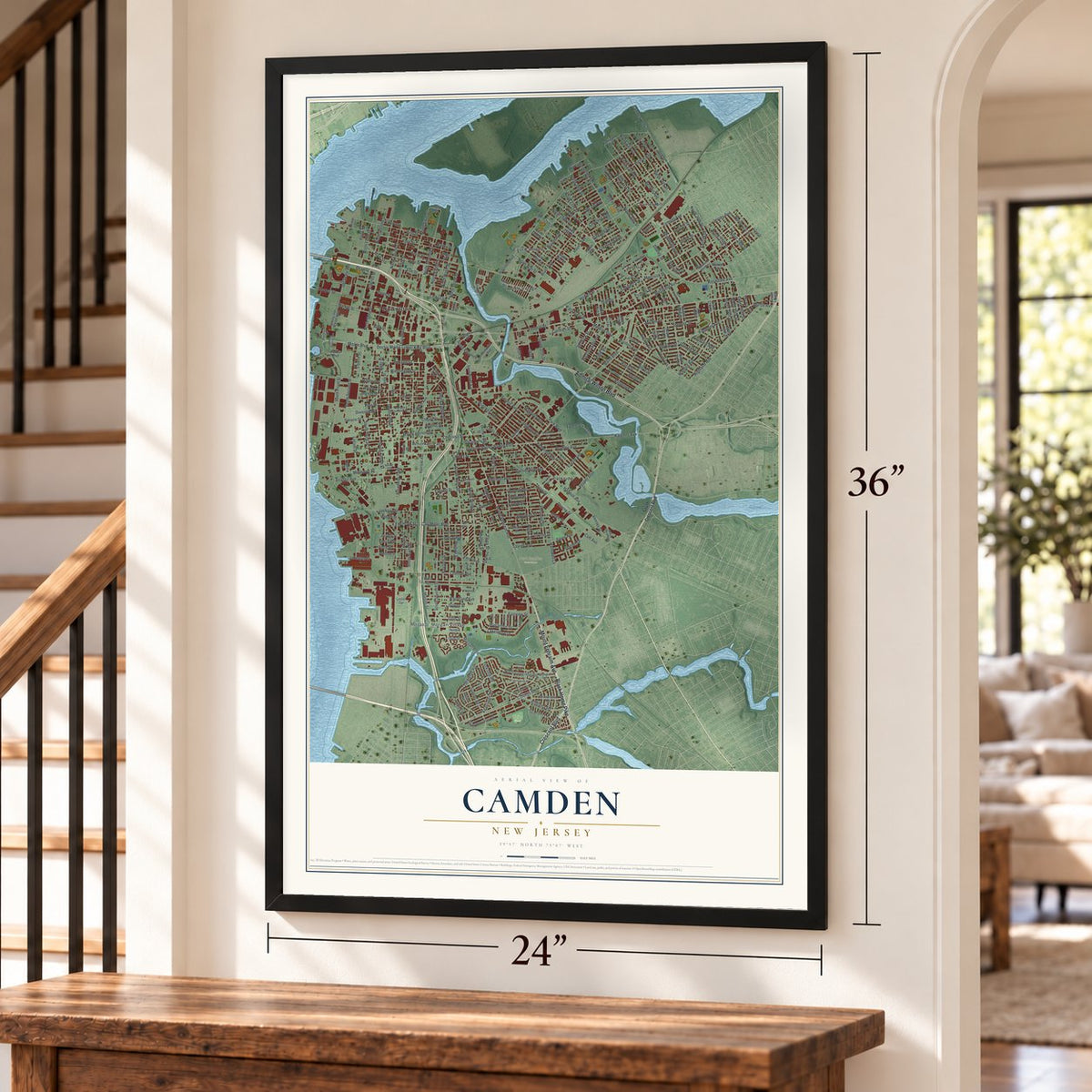 Camden, New Jersey map, 24 x 36 inch print in a black frame by a staircase