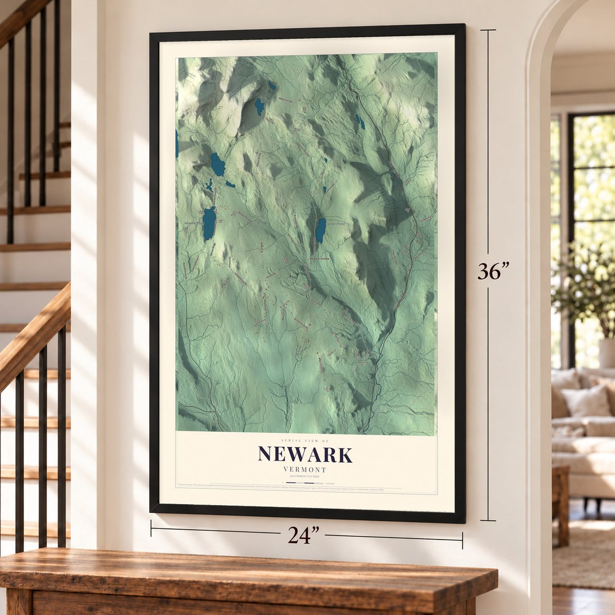 Newark, Vermont map, 24 x 36 inch print in a black frame by a staircase