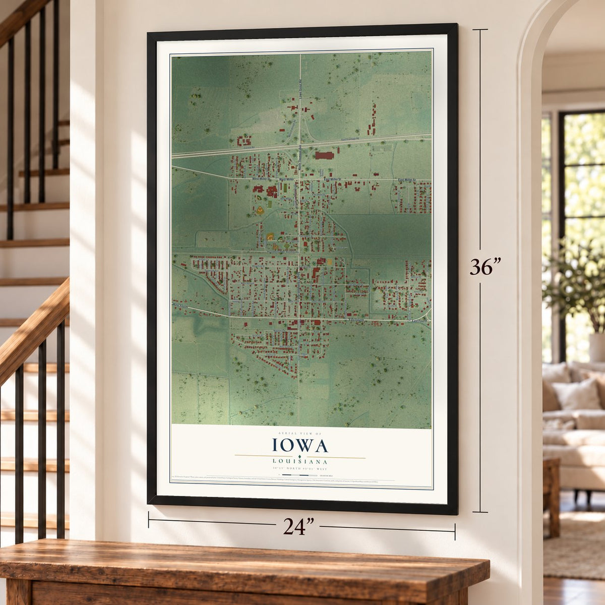 Iowa, Louisiana map, 24 x 36 inch print in a black frame by a staircase