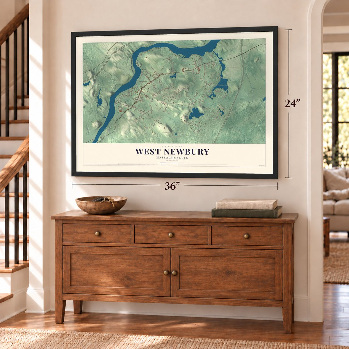 West Newbury, Massachusetts map, 24 x 36 inch print in a black frame above a dresser by a staircase
