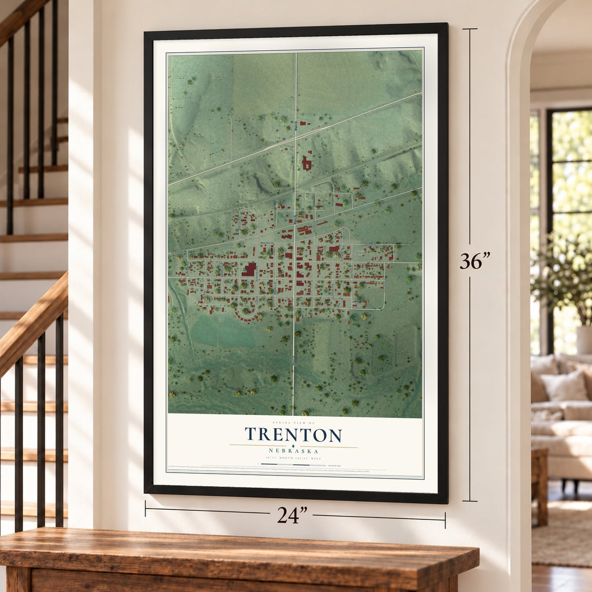 Trenton, Nebraska map, 24 x 36 inch print in a black frame by a staircase