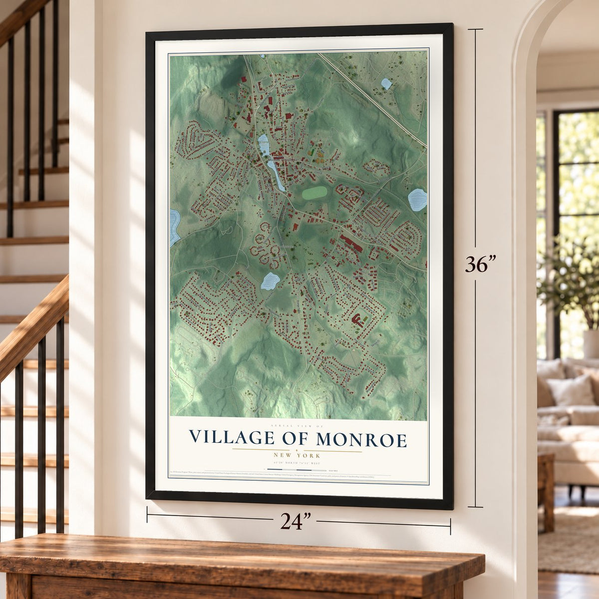 Village of Monroe, New York map, 24 x 36 inch print in a black frame by a staircase