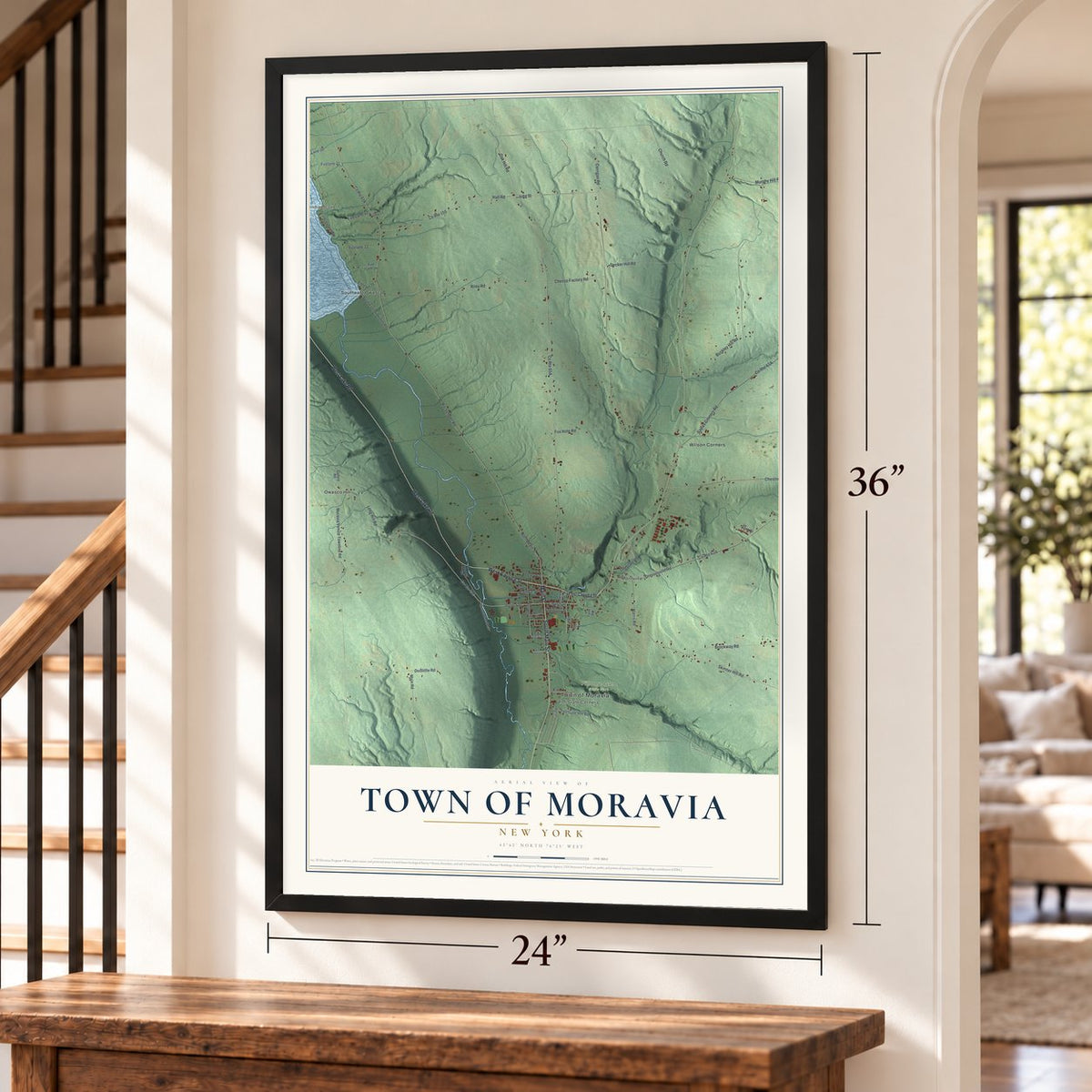 Town of Moravia, New York map, 24 x 36 inch print in a black frame by a staircase