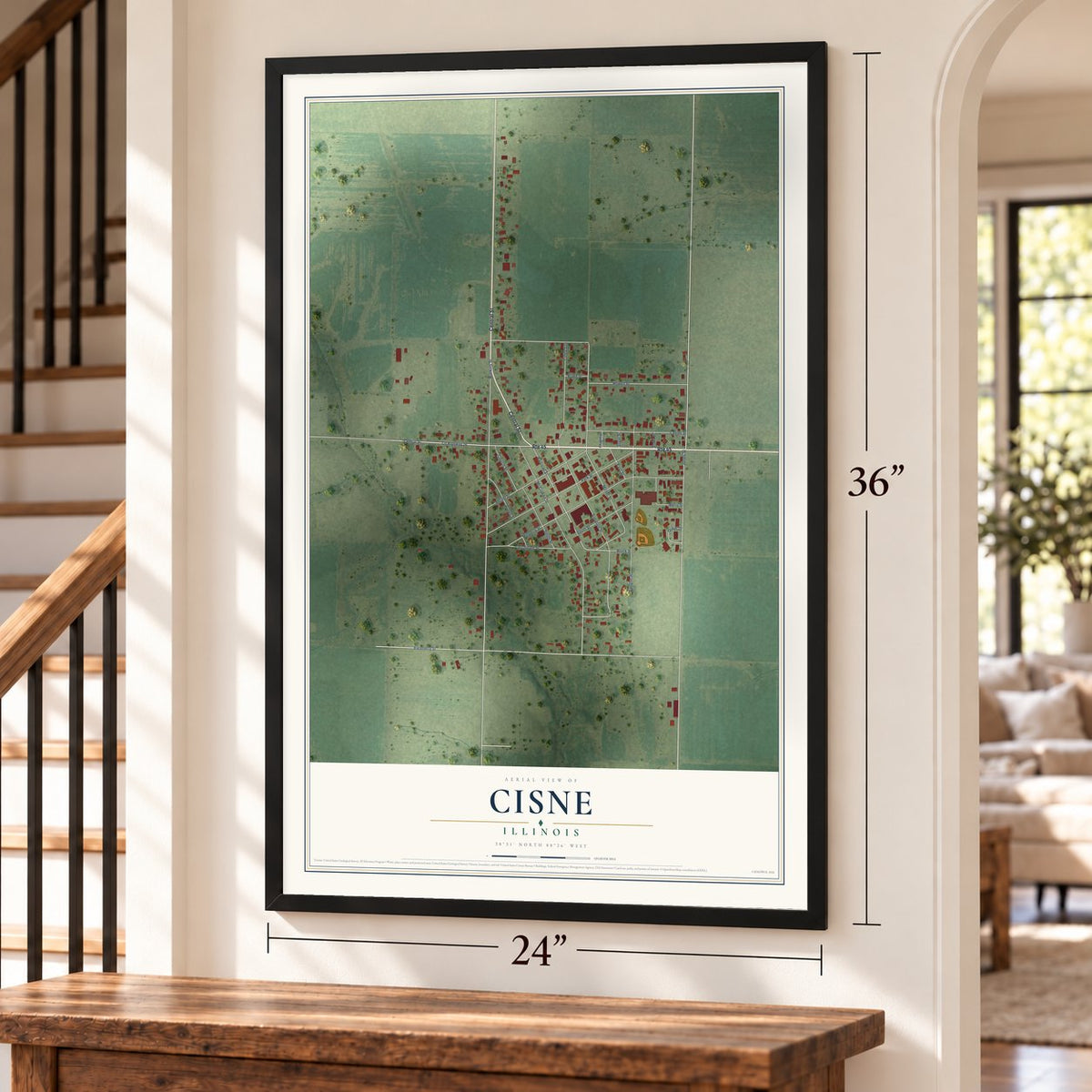 Cisne, Illinois map, 24 x 36 inch print in a black frame by a staircase