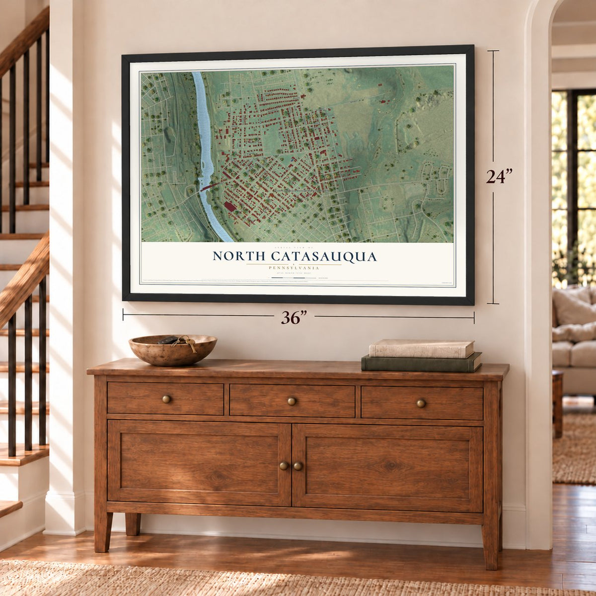 North Catasauqua, Pennsylvania map, 24 x 36 inch print in a black frame above a dresser by a staircase