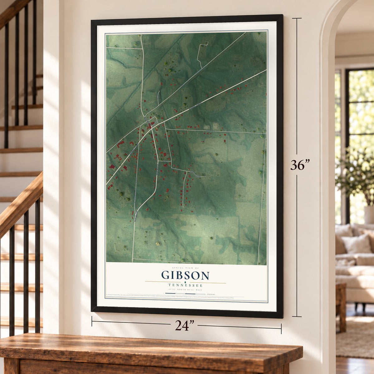 Gibson, Tennessee map, 24 x 36 inch print in a black frame by a staircase