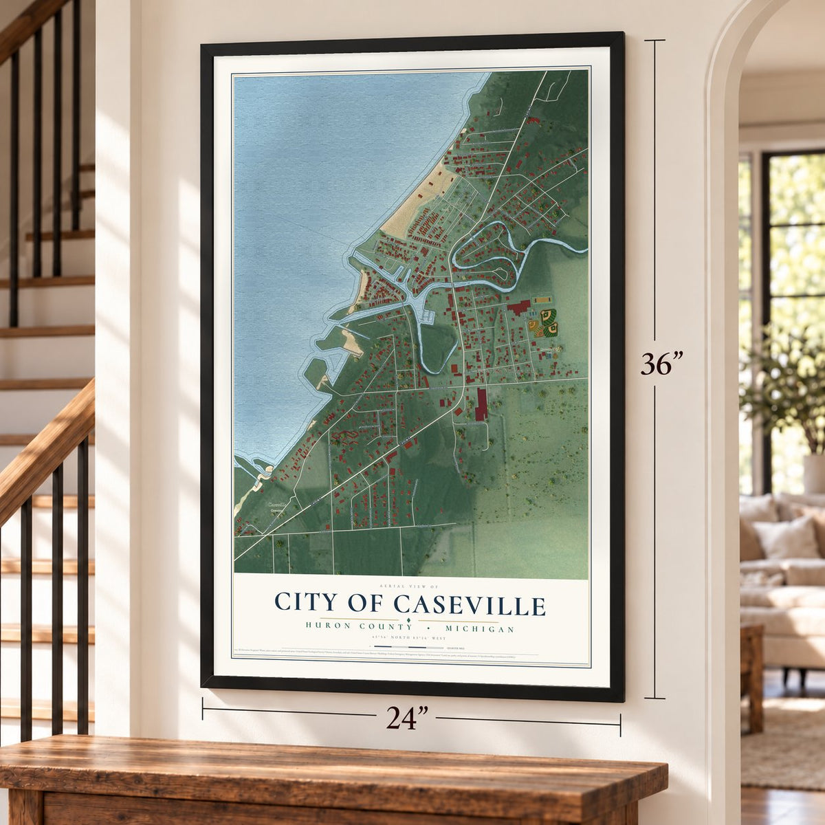 Caseville, Michigan map, 24 x 36 inch print in a black frame by a staircase