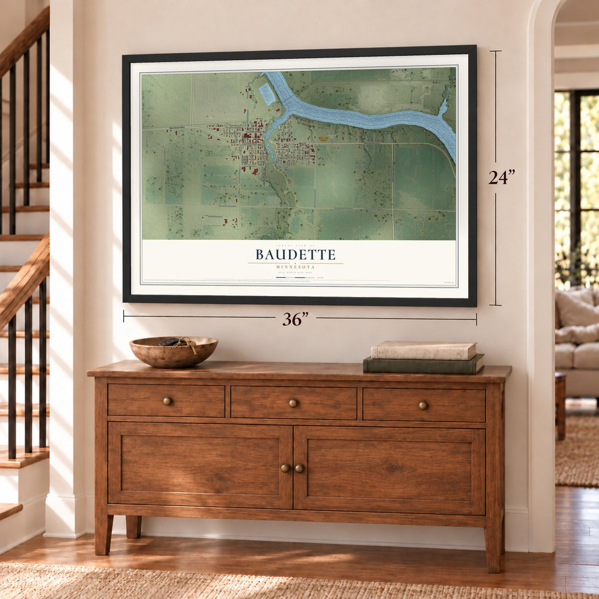 Baudette, Minnesota map, 24 x 36 inch print in a black frame above a dresser by a staircase
