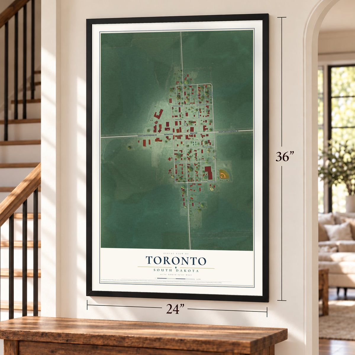 Toronto, South Dakota map, 24 x 36 inch print in a black frame by a staircase