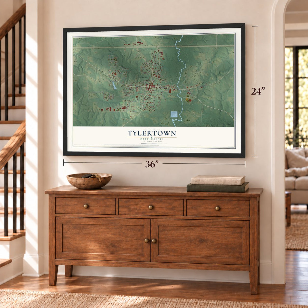 Tylertown, Mississippi map, 24 x 36 inch print in a black frame above a dresser by a staircase