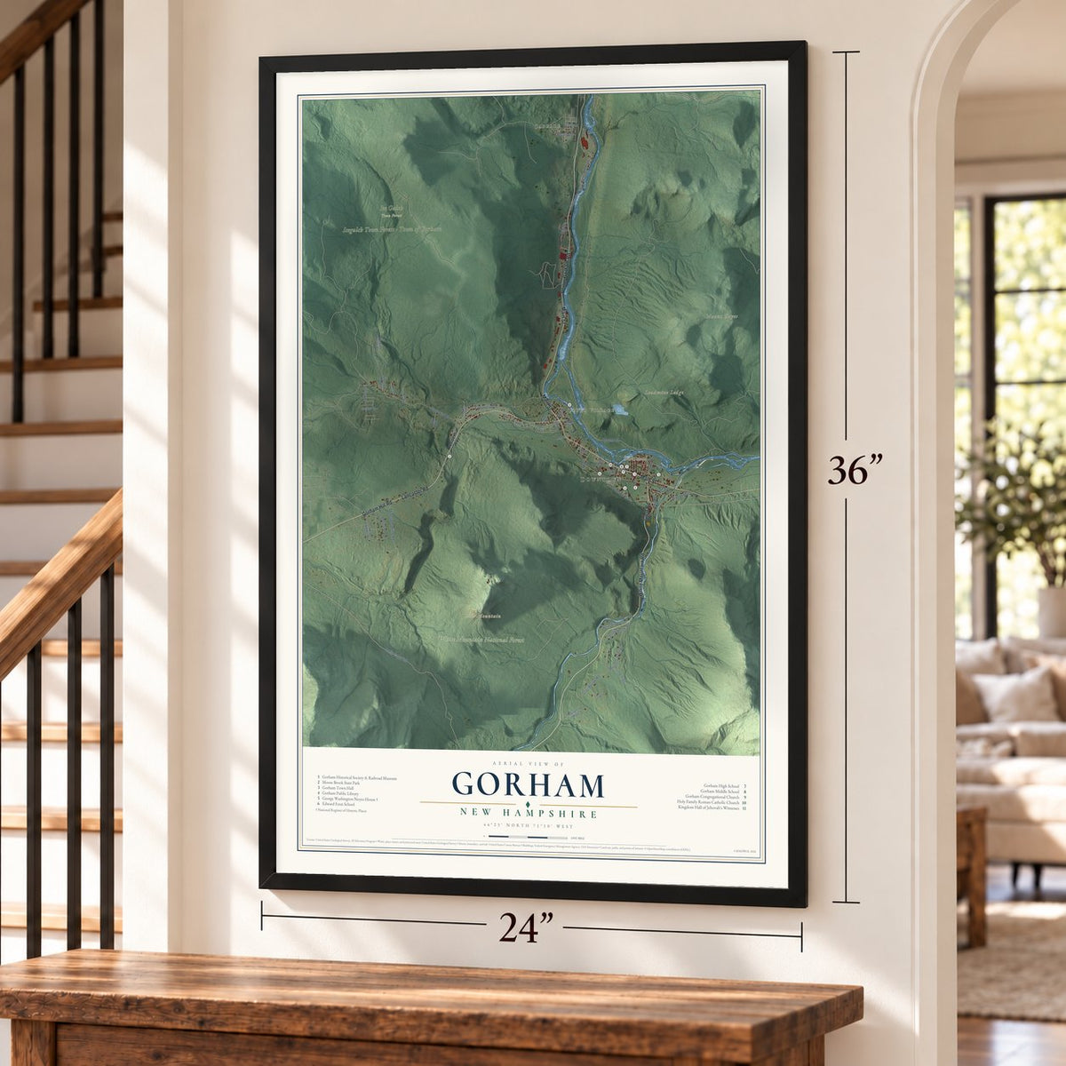 Gorham, New Hampshire map, 24 x 36 inch print in a black frame by a staircase
