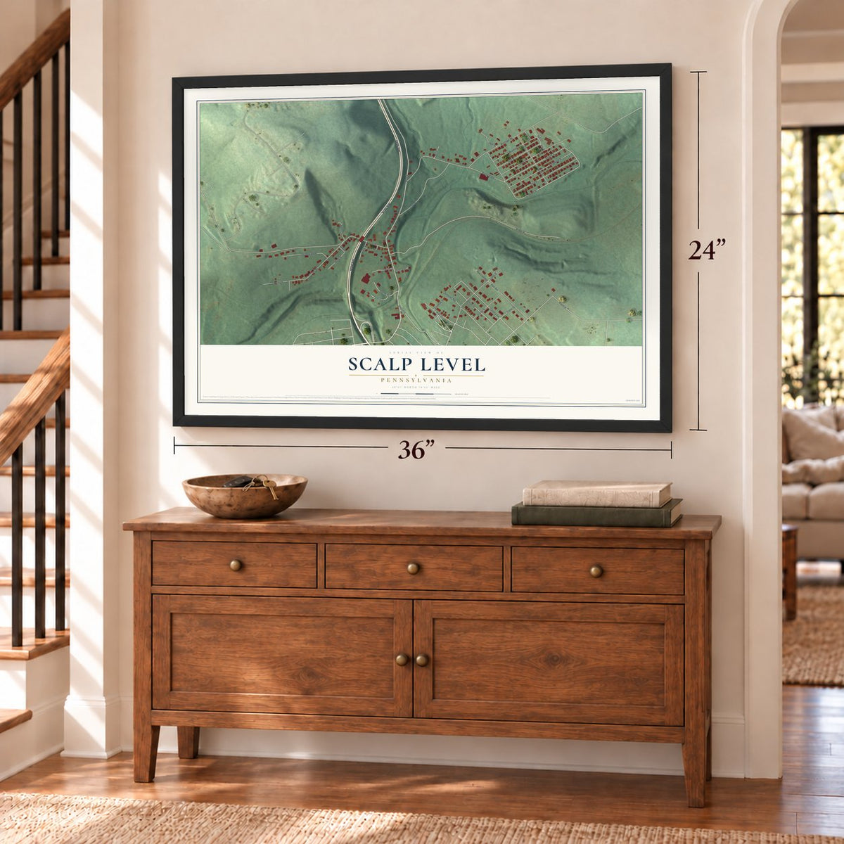 Scalp Level, Pennsylvania map, 24 x 36 inch print in a black frame above a dresser by a staircase
