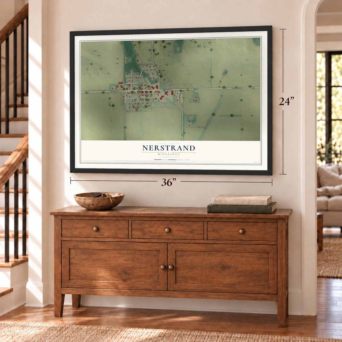 Nerstrand, Minnesota map, 24 x 36 inch print in a black frame above a dresser by a staircase
