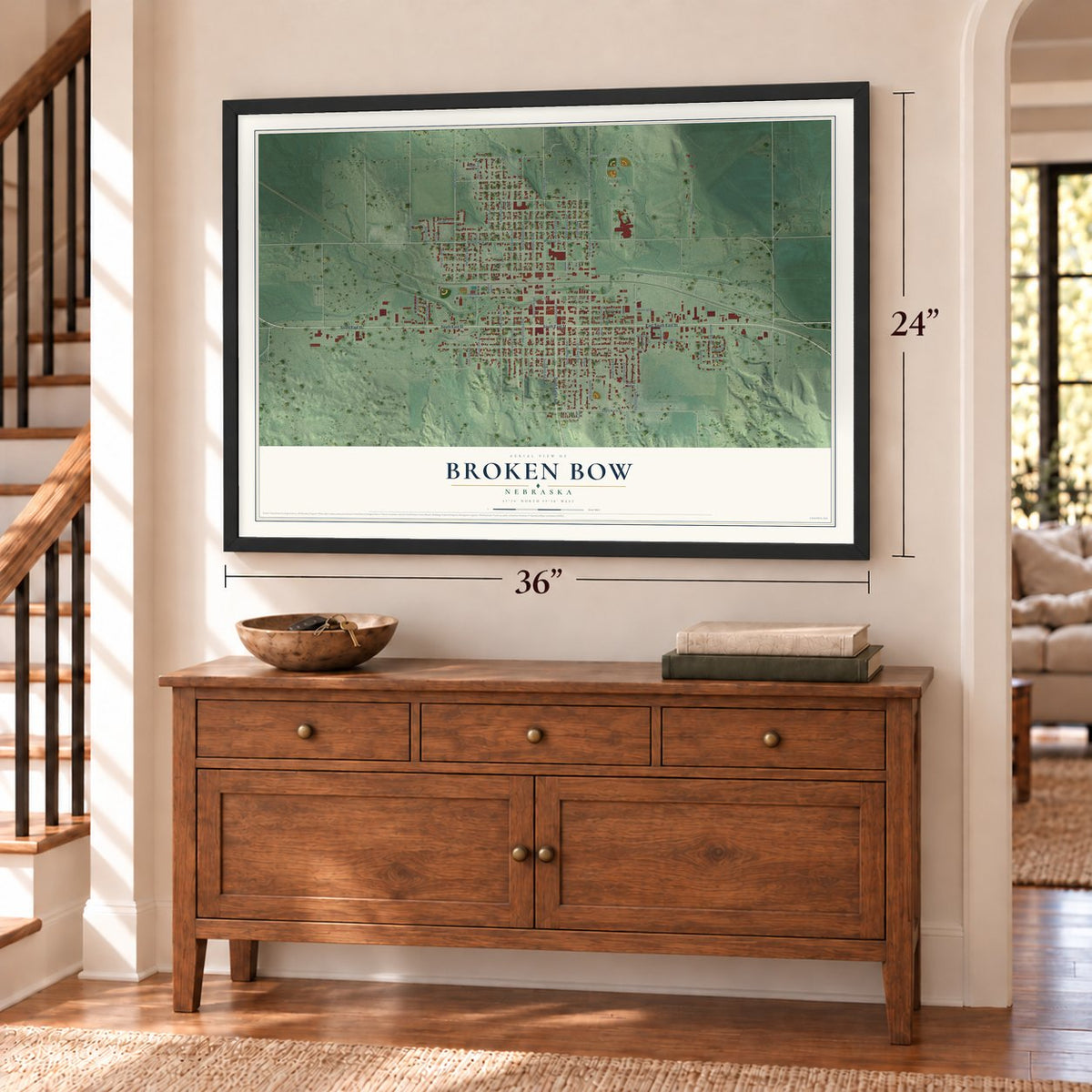Broken Bow, Nebraska map, 24 x 36 inch print in a black frame above a dresser by a staircase