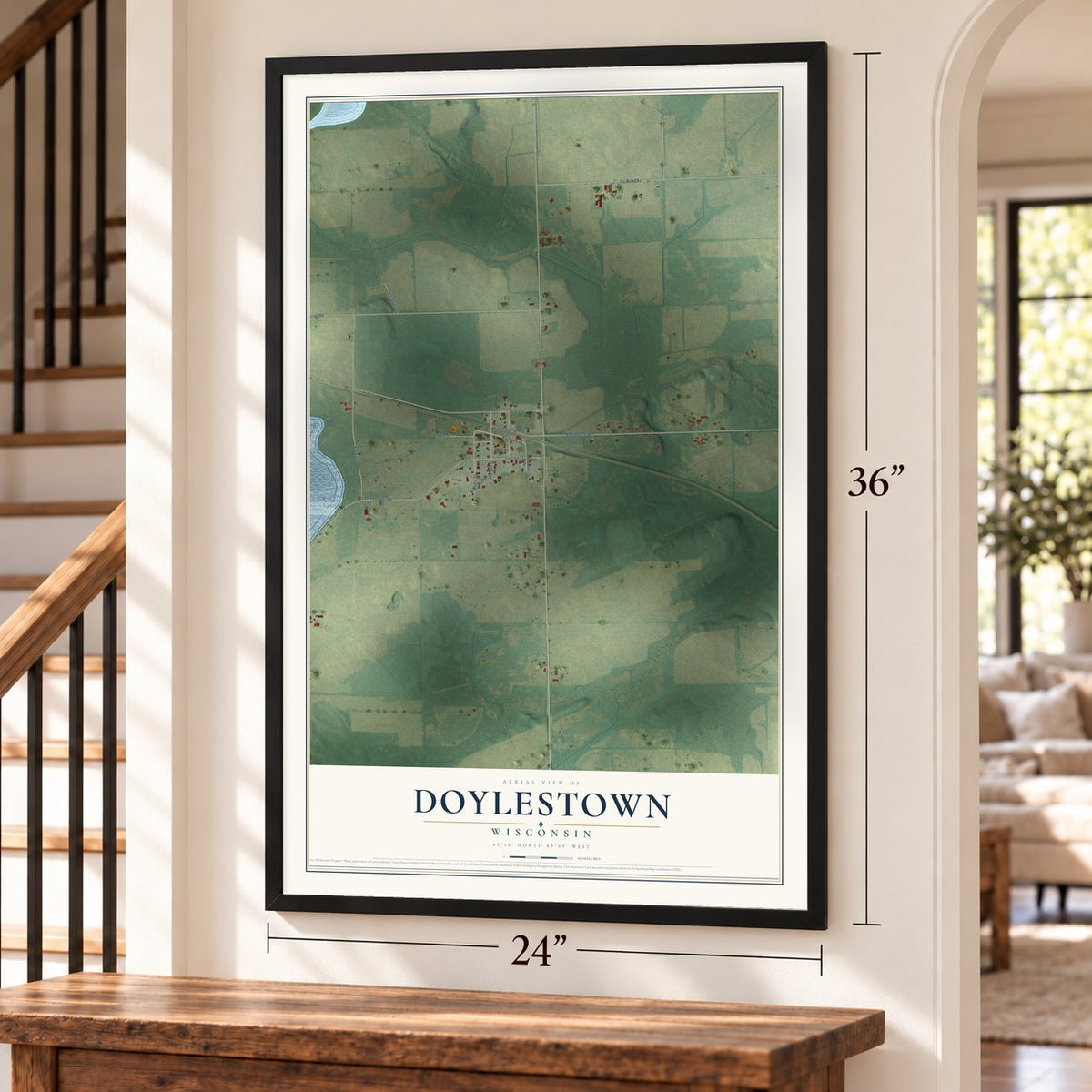 Doylestown, Wisconsin map, 24 x 36 inch print in a black frame by a staircase