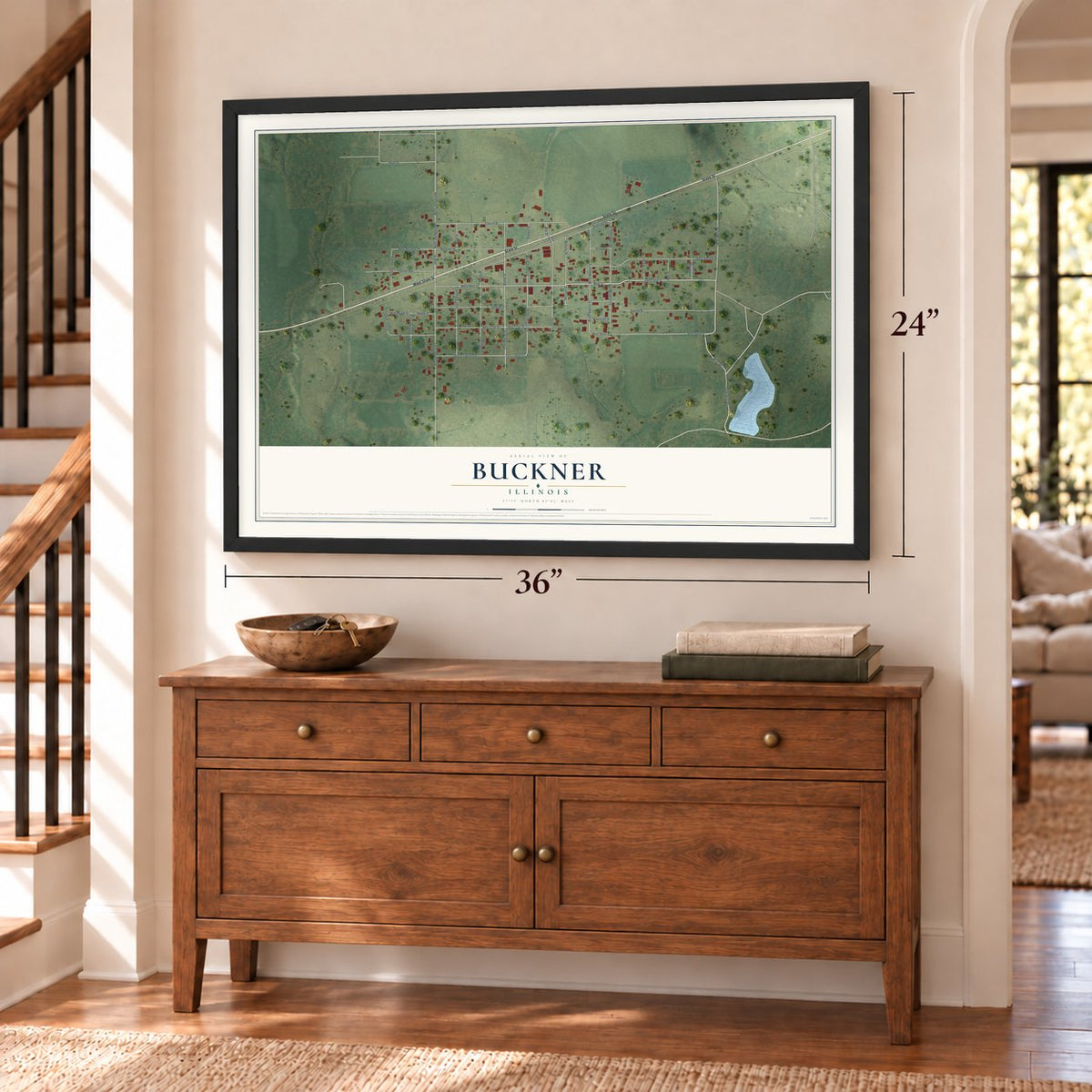 Buckner, Illinois map, 24 x 36 inch print in a black frame above a dresser by a staircase