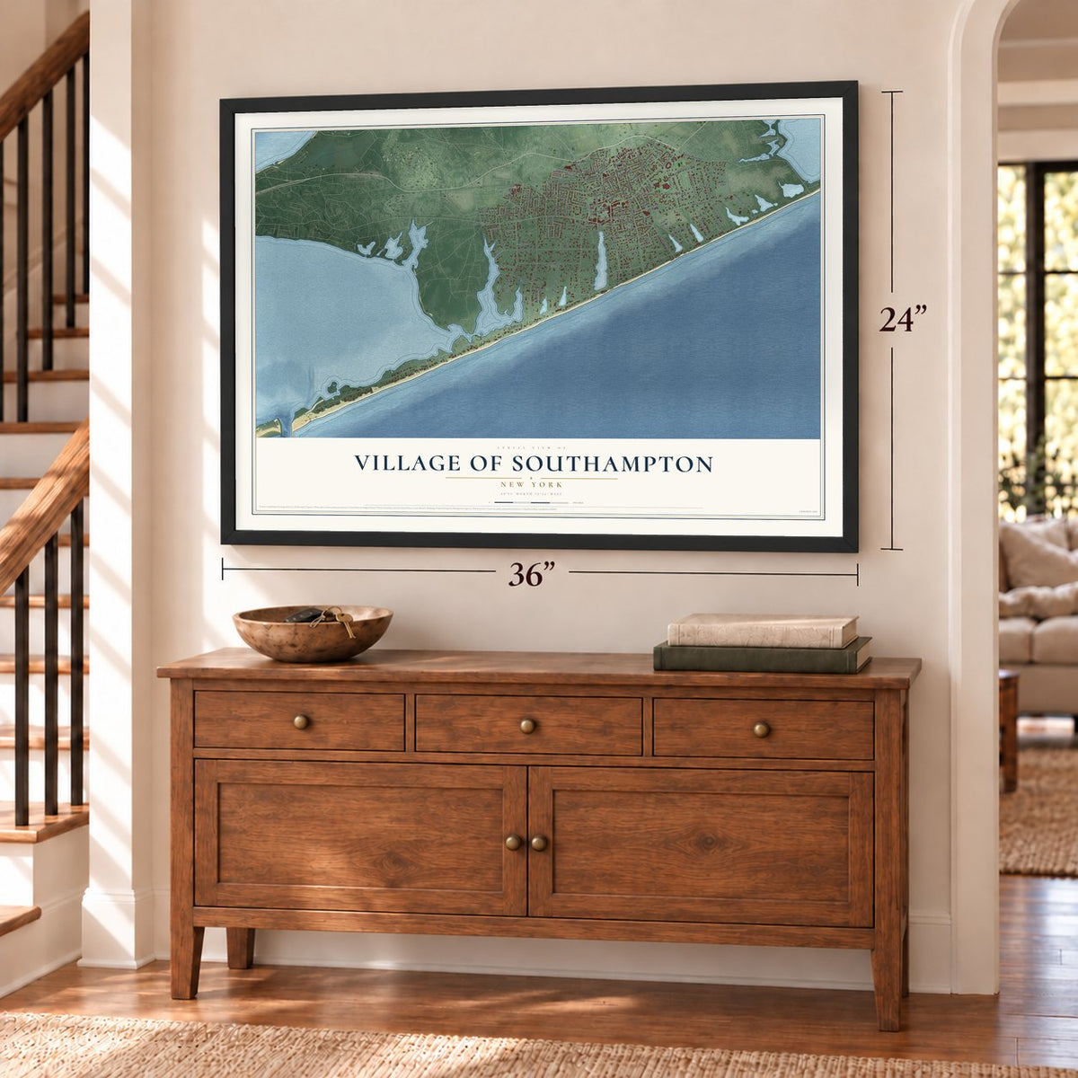 Village of Southampton, New York map, 24 x 36 inch print in a black frame above a dresser by a staircase