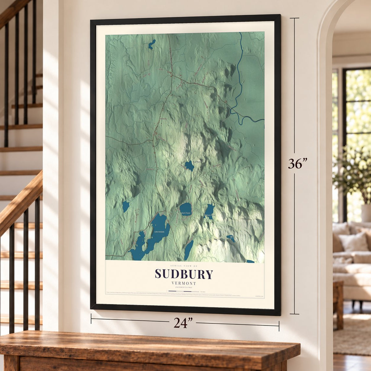 Sudbury, Vermont map, 24 x 36 inch print in a black frame by a staircase