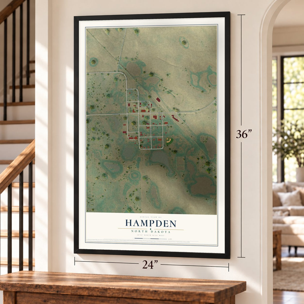 Hampden, North Dakota map, 24 x 36 inch print in a black frame by a staircase