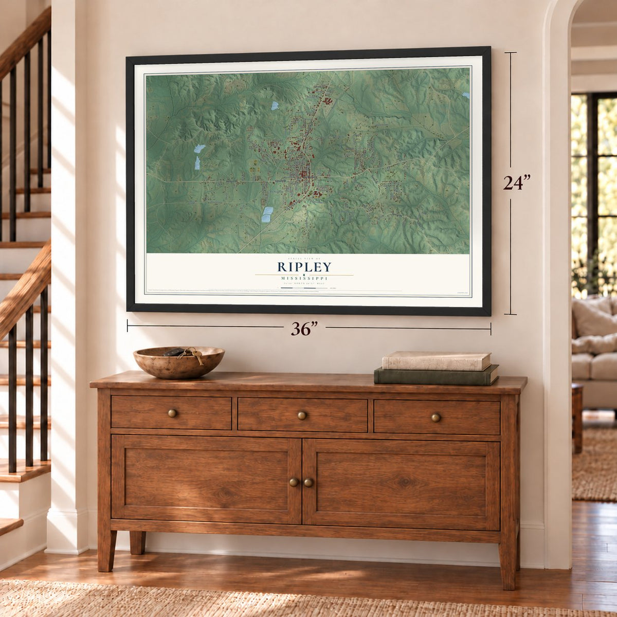Ripley, Mississippi map, 24 x 36 inch print in a black frame above a dresser by a staircase