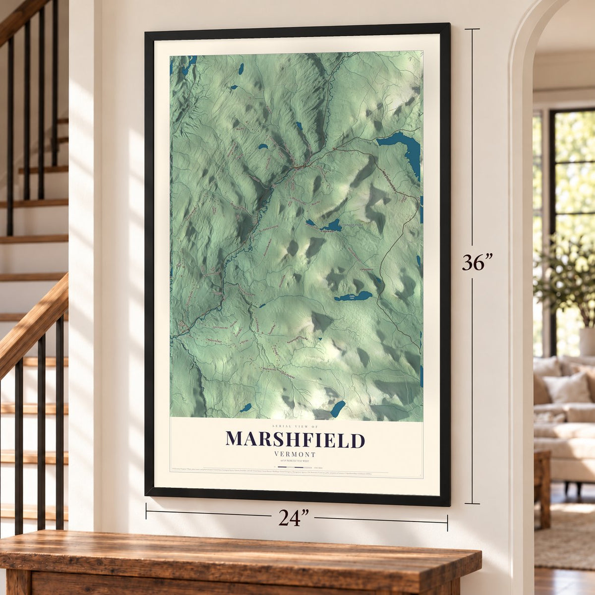 Marshfield, Vermont map, 24 x 36 inch print in a black frame by a staircase