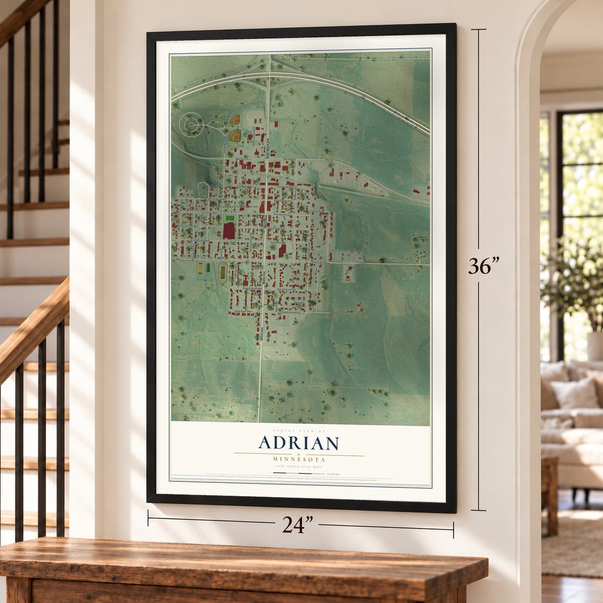 Adrian, Minnesota map, 24 x 36 inch print in a black frame by a staircase