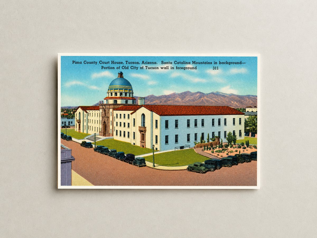 Tucson, AZ: Pima County Court House, Tucson, Arizona, Santa Catalina Mountains in background- portion of Old City of Tucson wall in foreground