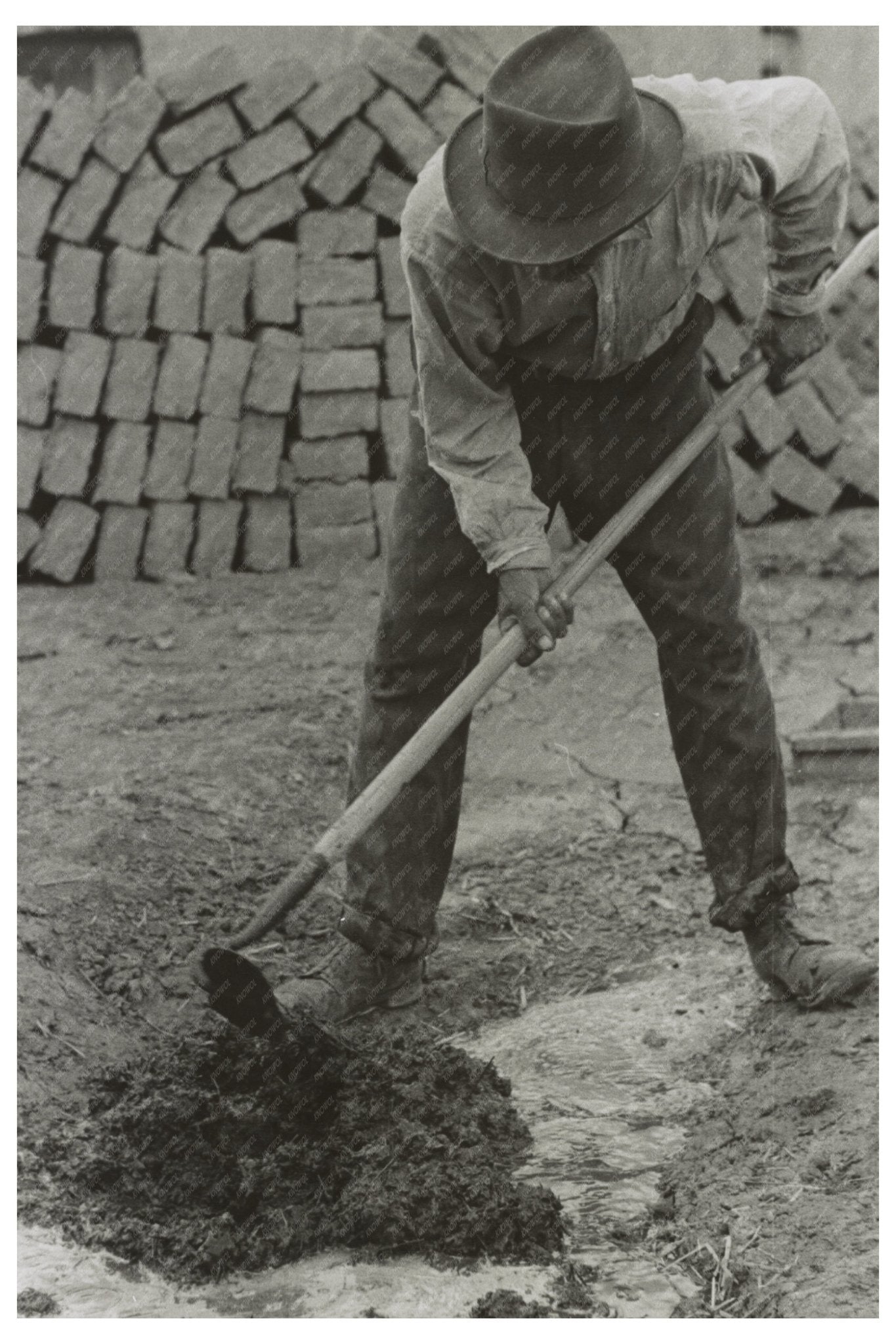 Adobe Brick Mixture in Chamisal New Mexico 1940 - Available at KNOWOL