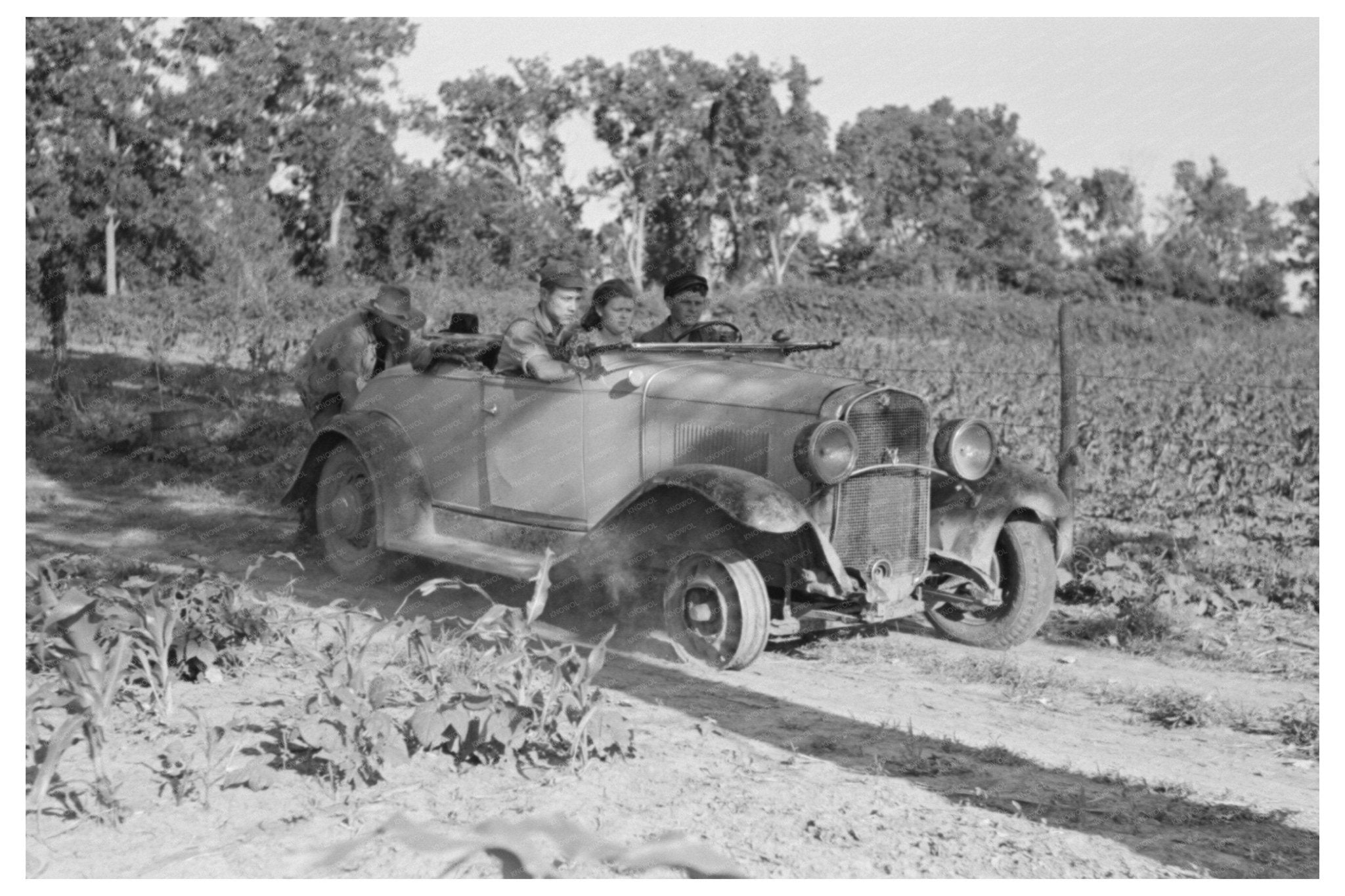 Agricultural Day Laborers Push Car Muskogee County 1939 - Available at KNOWOL